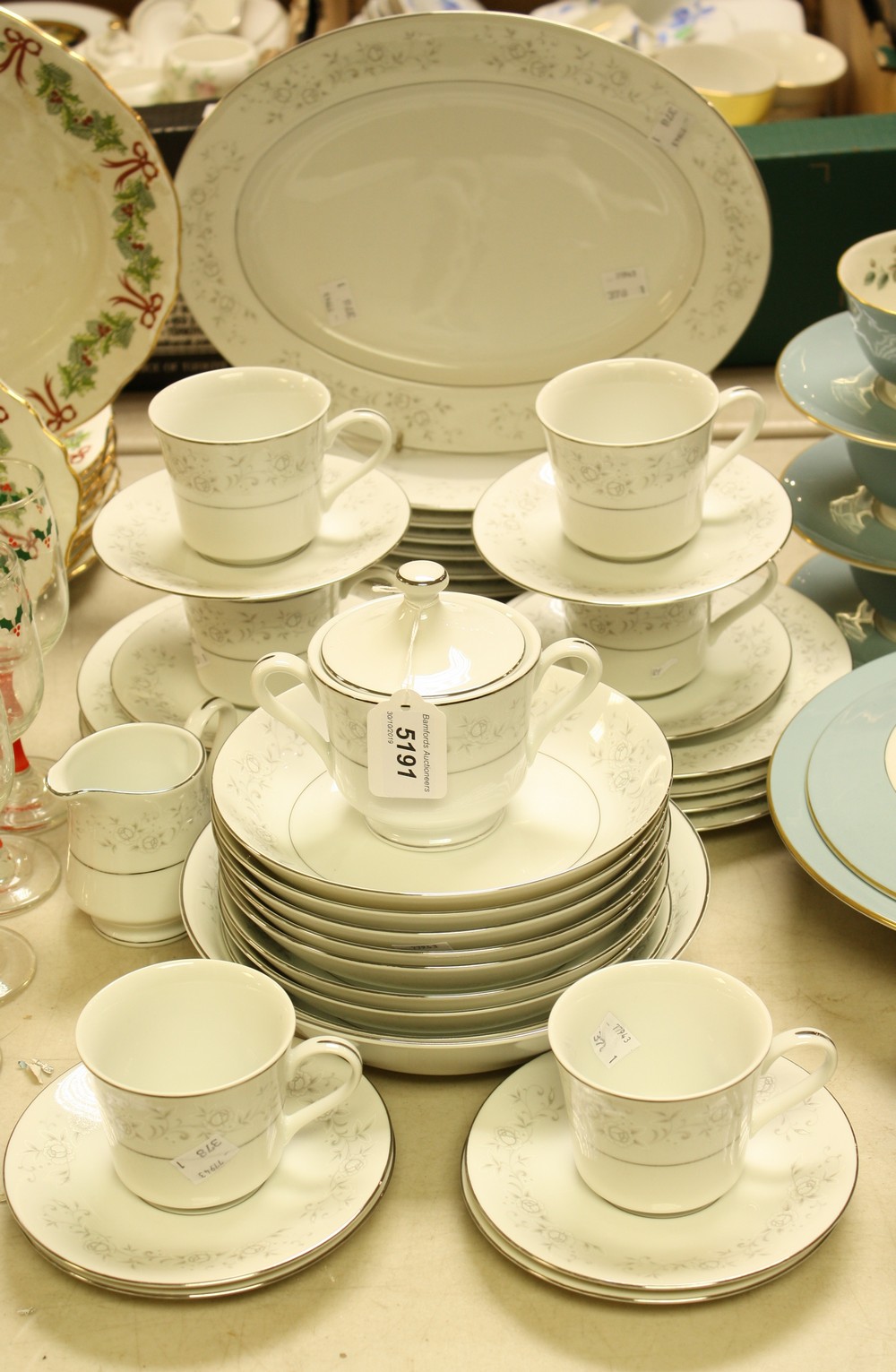 A Platinum Rose pattern part dinner service, comprising dinner plates, side plates, serving dishes,