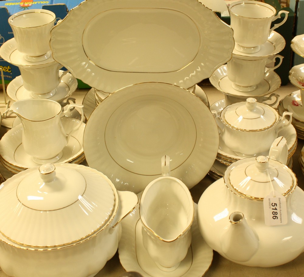 A Chodziez Polish white with gilt edge dinner and tea service, comprising tureen, serving platter,