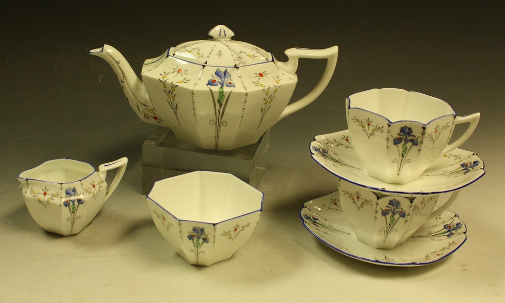 A Shelley Queen Anne Blue Iris pattern tea for two, comprising teapot, milk jug,