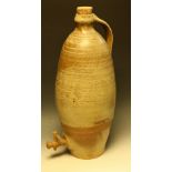 Studio Pottery - a large ribbed ovoid stoneware flagon, single handle,