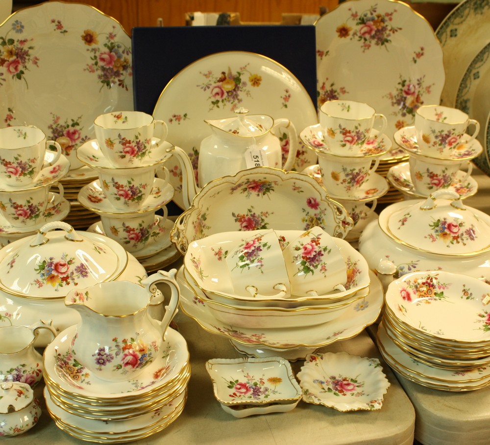 An extensive Royal Crown Derby Posies pattern dinner and tea set, for twelve,