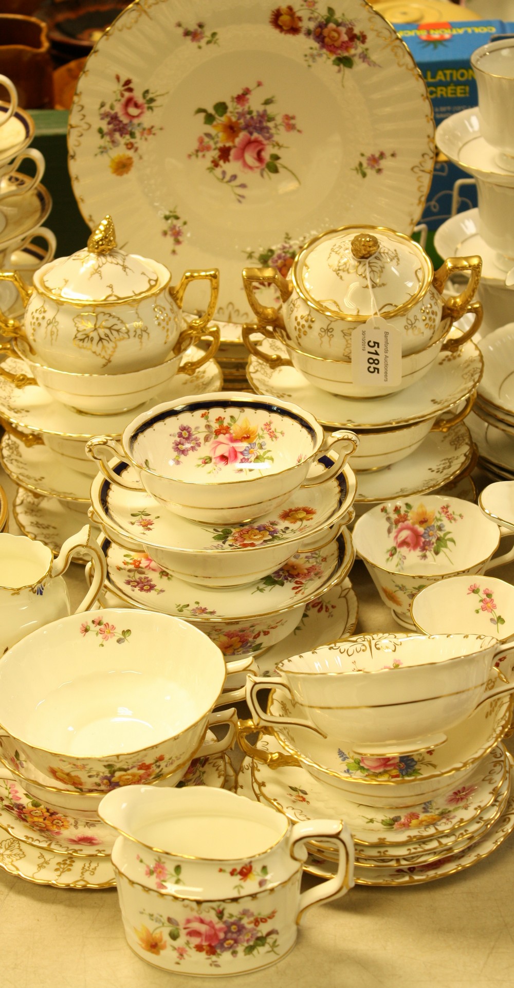 A quantity of Royal Crown Derby table ware, various patterns including Posies, Vine,