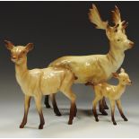 A Beswick stag, doe and fawn,