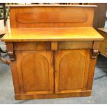A Victorian mahogany chiffonier/buffet with two short drawers to frieze above cross banded arched