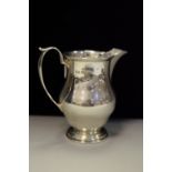 A Mappin & Webb silver cream jug