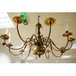 A set of three 10-branch brass chandeliers