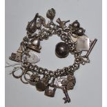 A silver charm braclet. 82.5g gross.