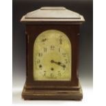 An early 20th century mahogany mantel clock, chime silent and fast/slow apertures, c.