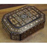 An early 20th century Vizagapatam work box, profusely inlaid with mother of pearl,