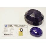 Gemstones - a dark blue sapphire 1678ct, with EGL certificate; another, smaller,