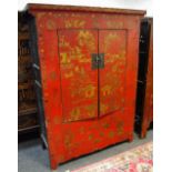 An oriental hardwood double wardrobe, two doors, painted in gilt,