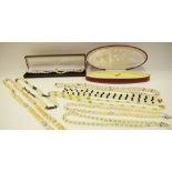 Various cultured pearl necklaces including a H.