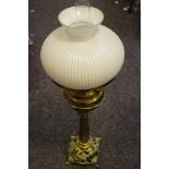 A Victorian brass oil lamp, Corinthian column with decorative pierced base c.