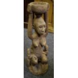 Tribal Art - a carved hardwood fertility figure, a lady holding a bowl aloft,
