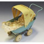 Toys - a mid-20th century tin plate pram