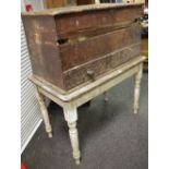 A rustic Victorian painted pine kitchen table; a Victorian stained pine mule chest;