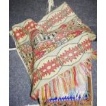 Textiles - a Middle Eastern tribal hanging; a woollen blanket,