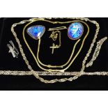 A 9ct gold necklace and bracelet set; a 9ct gold crucifix and chain; silver chains and CZ pendant;