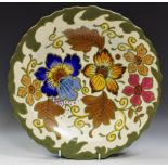 Goudh cabinet plate, decorated with blue and gold flowers on a cream base,