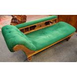 A Victorian chaise button upholstered scrolled arm, padded top rail, spindle back, turned feet,