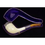 An early 20th century silver mounted meerschaum pipe