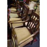 A pair of oak carver dining chairs; a bentwood chair;