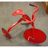 Toys - a retro red painted child's tricycle