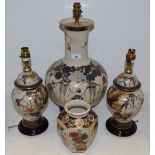 A pair of Satsuma style temple vase lamps; another larger; a Japanese ironstone vase,