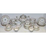 An early 19th century tea service, comprising teapot, seven large cups, four smaller cups,