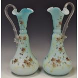A pair of Victorian frosted glass jugs