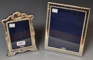 A silver photograph frame, London hallmarks, 23.5cm x 18.
