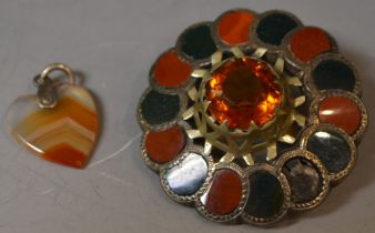 A large Scottish silver and agate brooch;