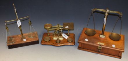 A set of 19th century apothecary scales, glass pans,