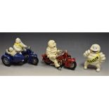 Advertising - a pair of reproduction cast metal Bibendum Michelin figures, on motorcycles; another,