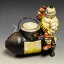 Advertising - a reproduction cast metal box, in the form of Bibendum, The Michelin Man,