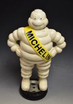 A reproduction cast metal figure, Bibendum Michelin Man,