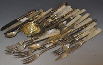 A set silver bladed fruit knives and conforming forks, mother of pearl handles, six forks,