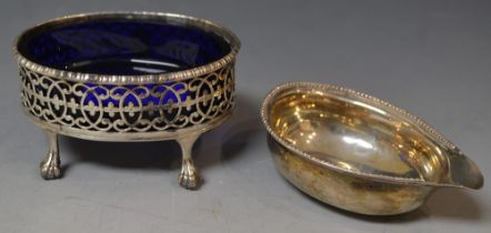 A George III silver pap boat, of small proportions; a George III silver oval open salt, blue liner,