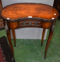 A Louis XV design metal mounted kidney shaped side table, drawer to frieze, slender serpentine legs,