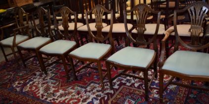 A set of six Hepplewhite design dining chairs,