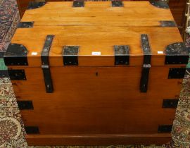 A 20th century pine campaign style metal bound travelling trunk/chest,