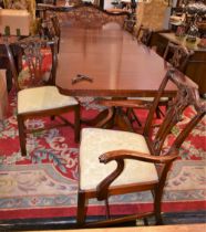 A large mahogany twin pedestal dining table,