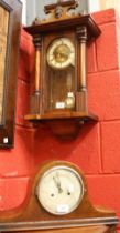 A mahogany Vienna wall clock key and pendulum;