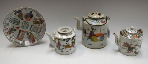 A Chinese Republican period tea kettle, decorated with figures, 15cm high,