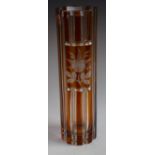 A large Bohemian glass vase, alternating bands of amber and clear glass,