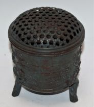 An Oriental bronzed censor, decorated with pine, bamboo and flowering cherry, 11.