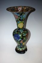 A 20th century cloisonné enamel baluster vase, bird and floral decoration on a black ground,