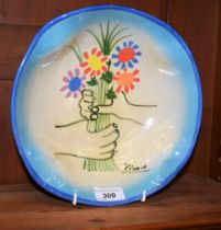 A terracotta slipware pinched circular bowl, signed Picasso,