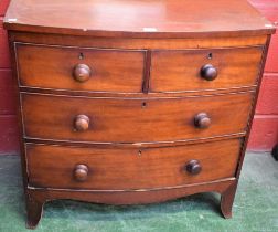 A Victorian mahogany bow-front chest, slightly oversailing top above two short and two long drawers,