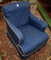 A Victorian easy armchair, painted mahogany legs,